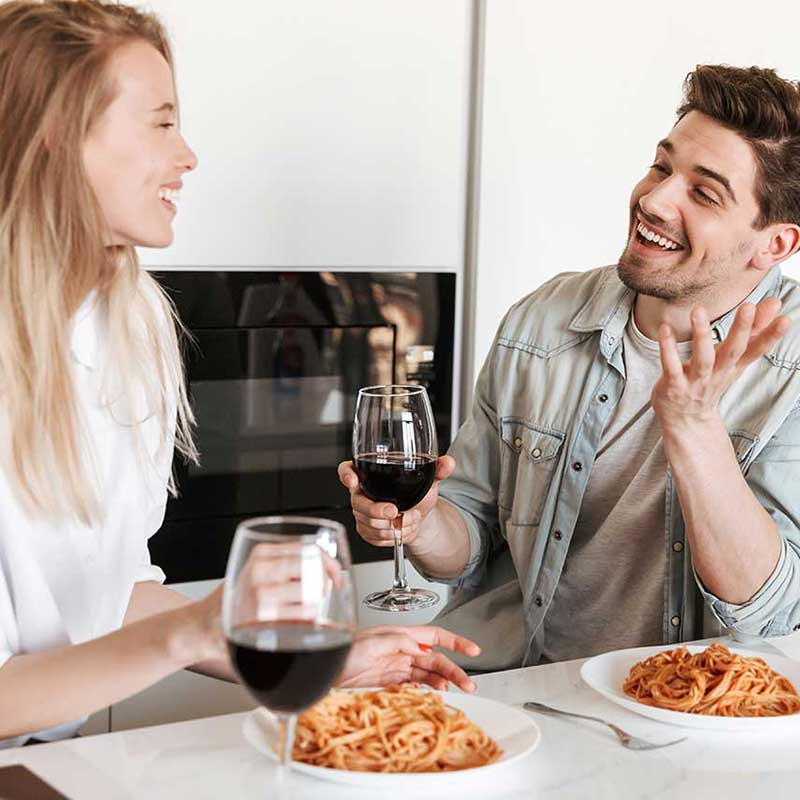 Couple enjoying delicious gourmet pasta from tukr box meal kit