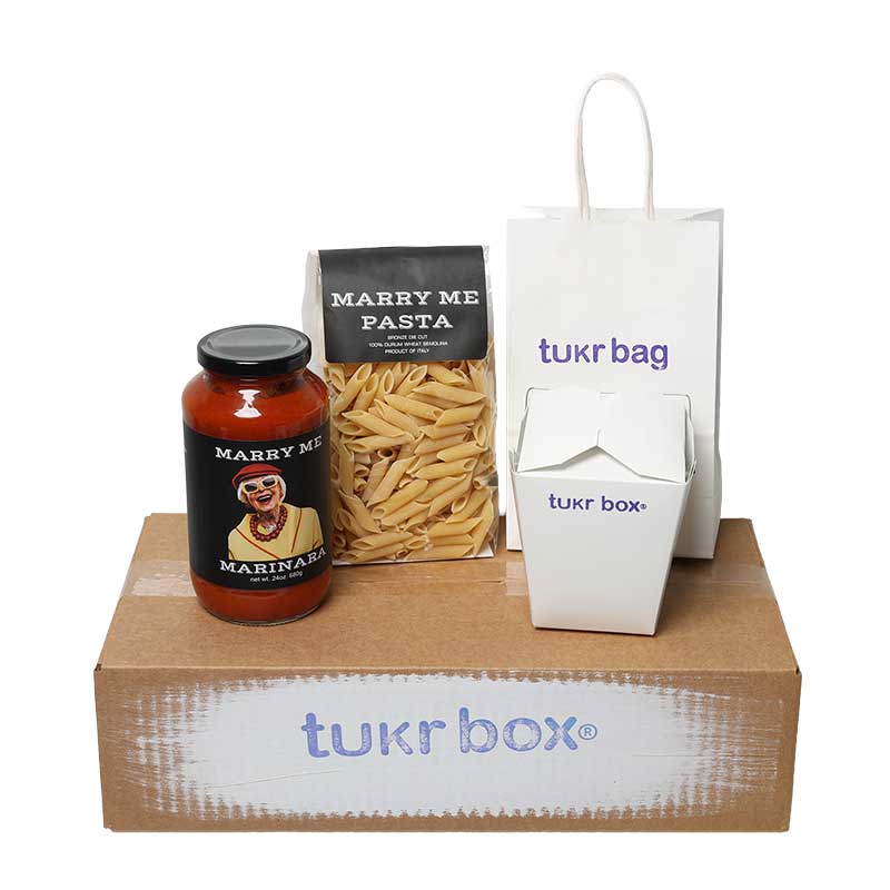 tukr box meal kit contents - premium penne pasta, Marry Me Marinara sauce, recipe card, and sharing supplies